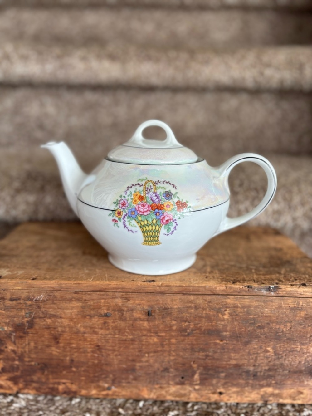 Iridescent White Teapot with Floral Basket Design